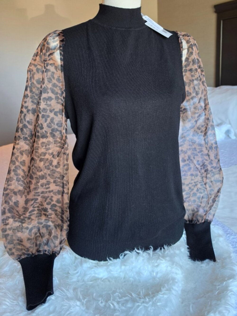 Black Leopard Sheer Sleeve Mock Neck Sweater Top – Size M NWT  Description: